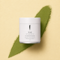 TAE Matcha House Surrender — 30g tin on a smear of matcha powder